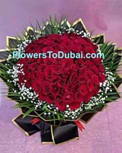 101 red roses with black paper 